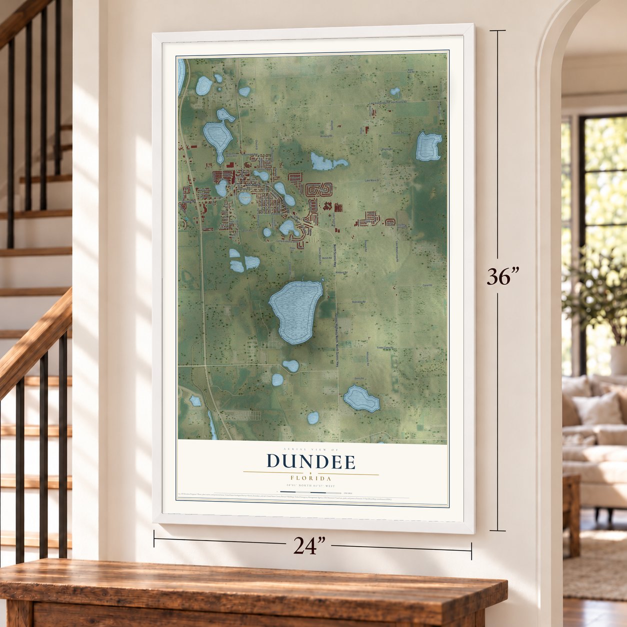 Dundee, Florida map, 24 x 36 inch print in a white frame by a staircase