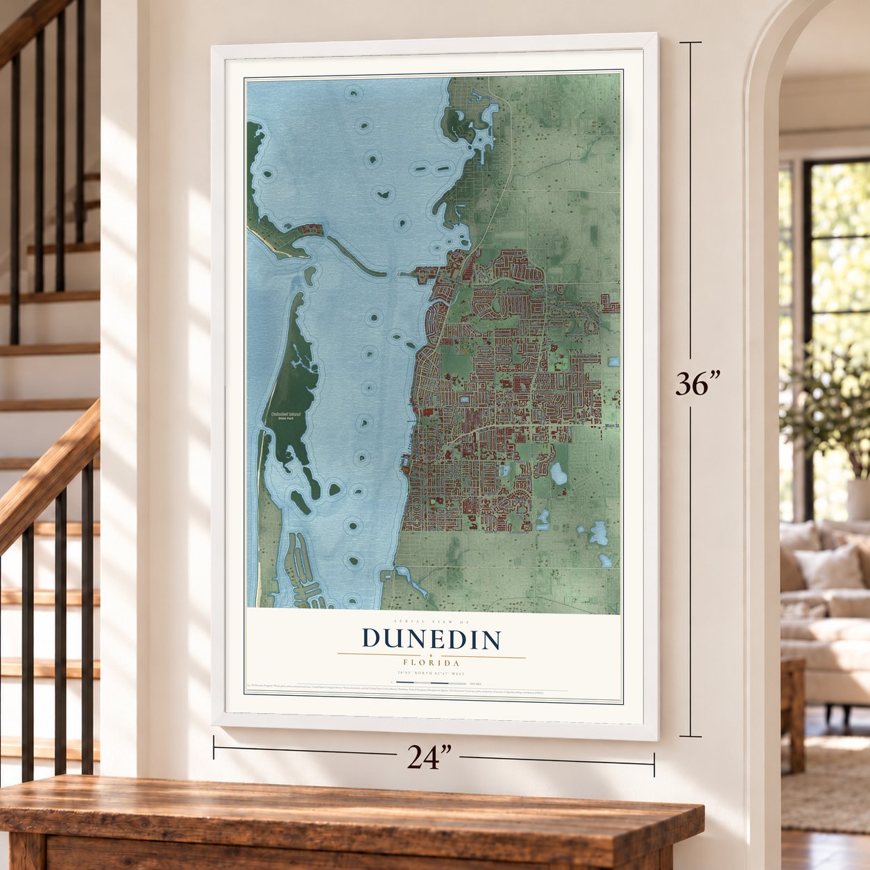 Dunedin, Florida map, 24 x 36 inch print in a white frame by a staircase