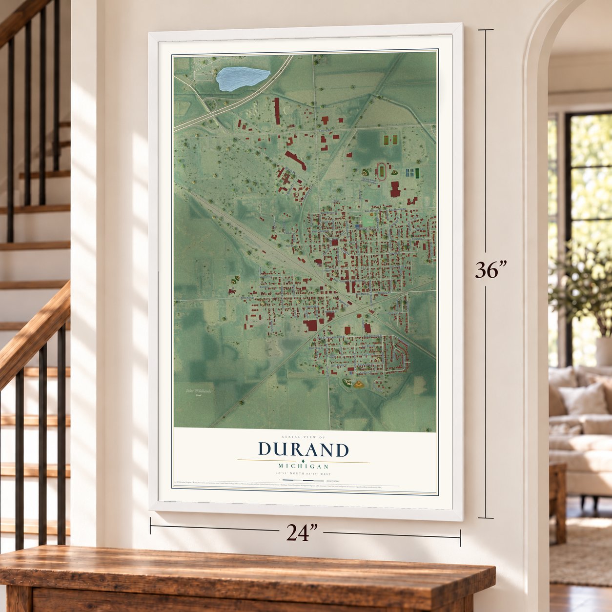 Durand, Michigan map, 24 x 36 inch print in a white frame by a staircase
