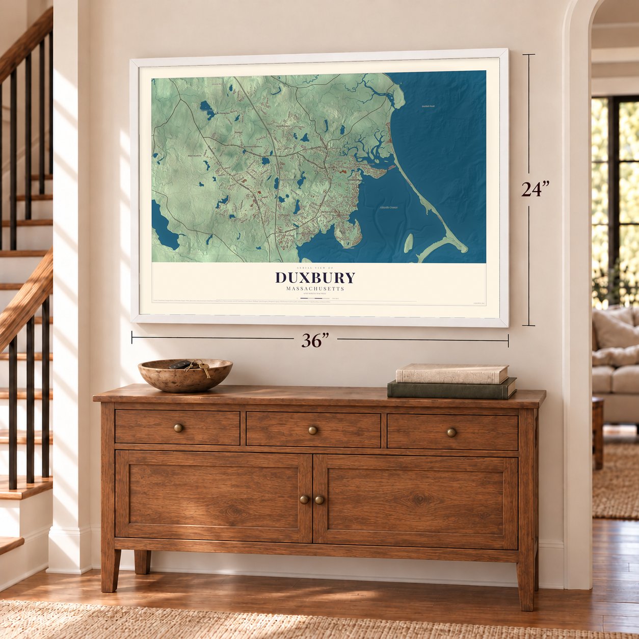 Duxbury, Massachusetts map, 24 x 36 inch print in a white frame above a dresser by a staircase
