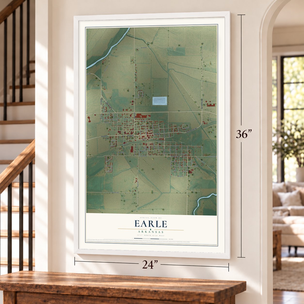 Earle, Arkansas map, 24 x 36 inch print in a white frame by a staircase