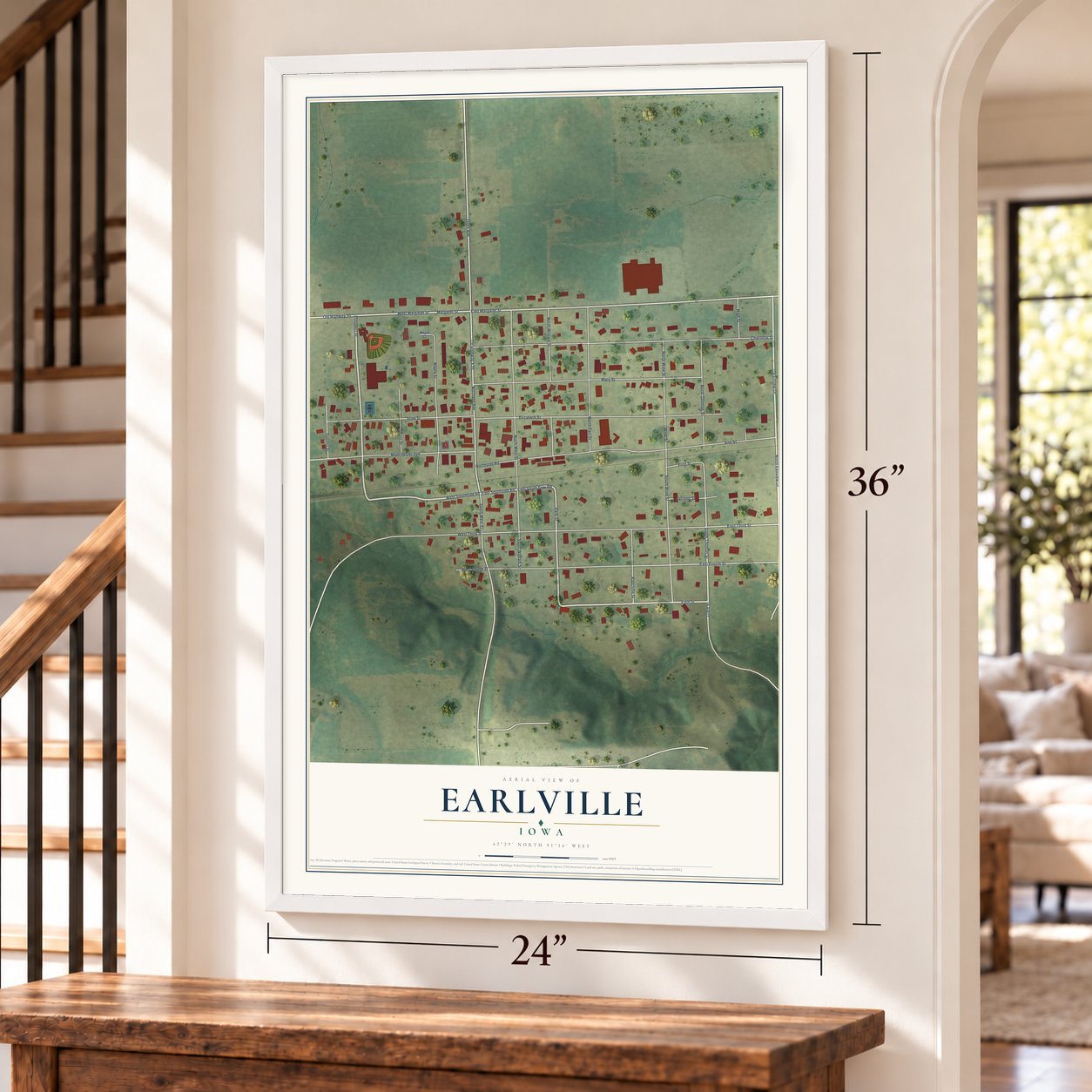 Earlville, Iowa map, 24 x 36 inch print in a white frame by a staircase