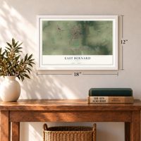 East Bernard, Texas map, 12 x 18 inch print in a white frame in an entryway