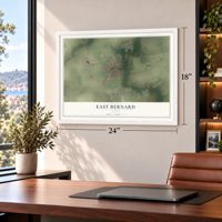 East Bernard, Texas map, 18 x 24 inch print in a white frame in a home office