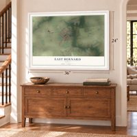 East Bernard, Texas map, 24 x 36 inch print in a white frame above a dresser by a staircase