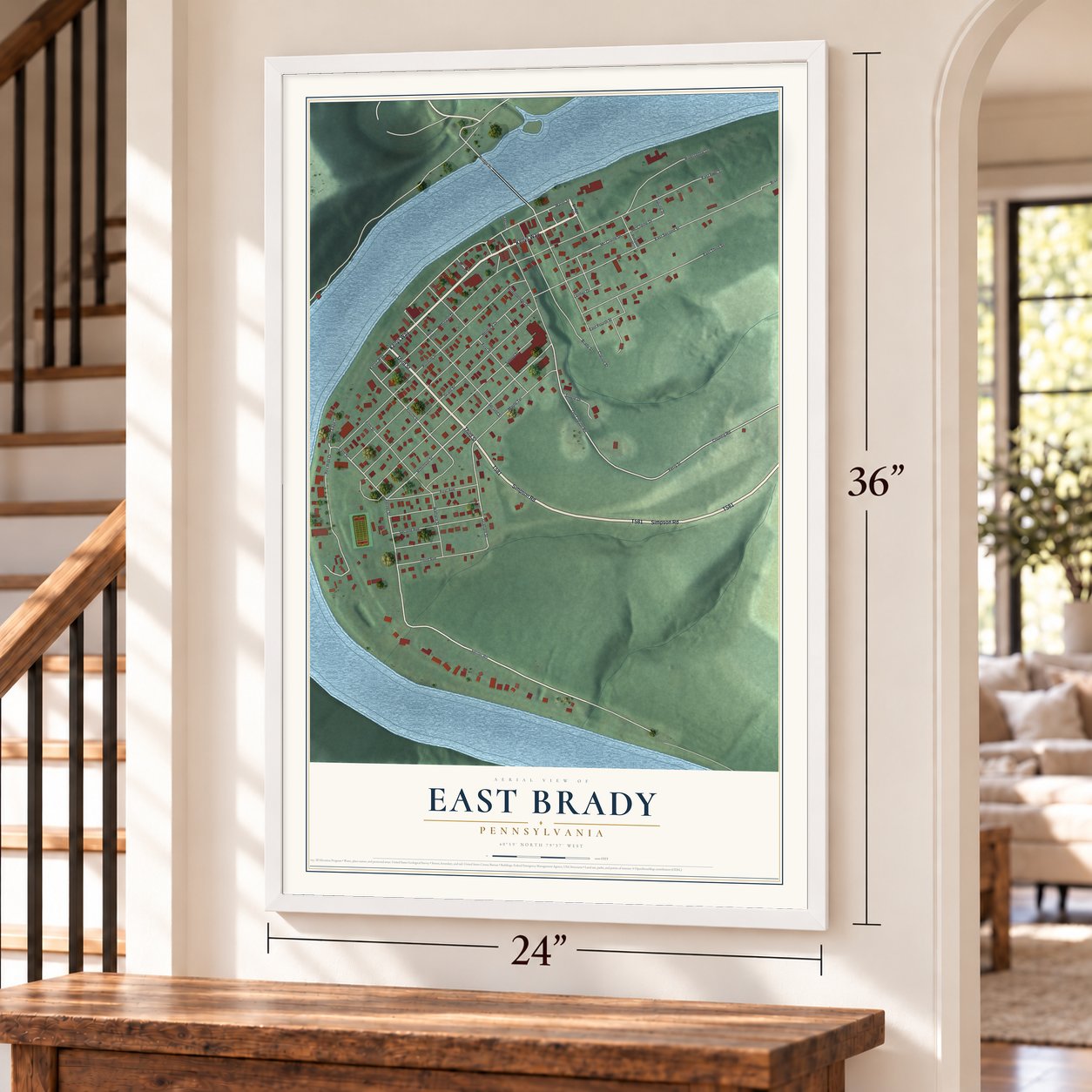 East Brady, Pennsylvania map, 24 x 36 inch print in a white frame by a staircase