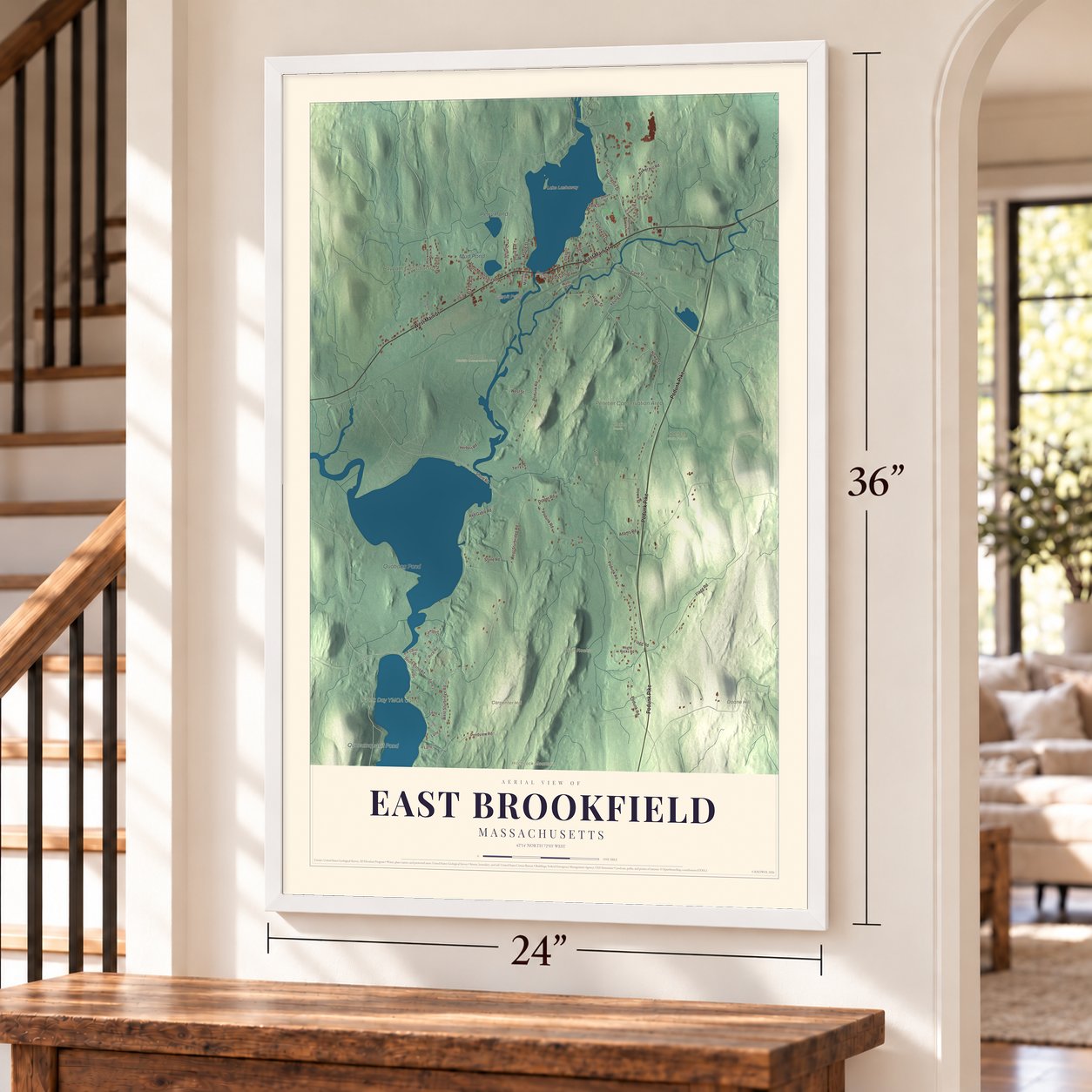 East Brookfield, Massachusetts map, 24 x 36 inch print in a white frame by a staircase