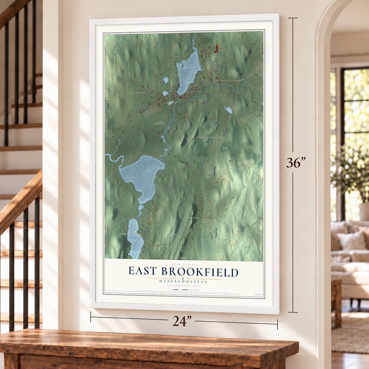 East Brookfield, Massachusetts map, 24 x 36 inch print in a white frame by a staircase