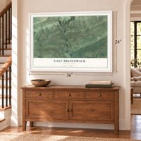 East Brunswick, Pennsylvania map, 24 x 36 inch print in a white frame above a dresser by a staircase