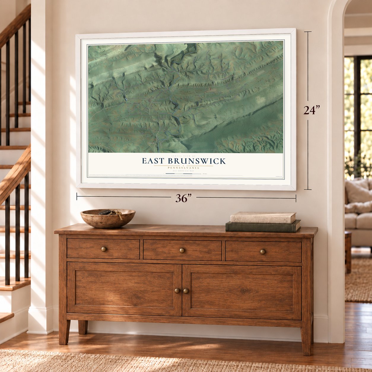 East Brunswick, Pennsylvania map, 24 x 36 inch print in a white frame above a dresser by a staircase