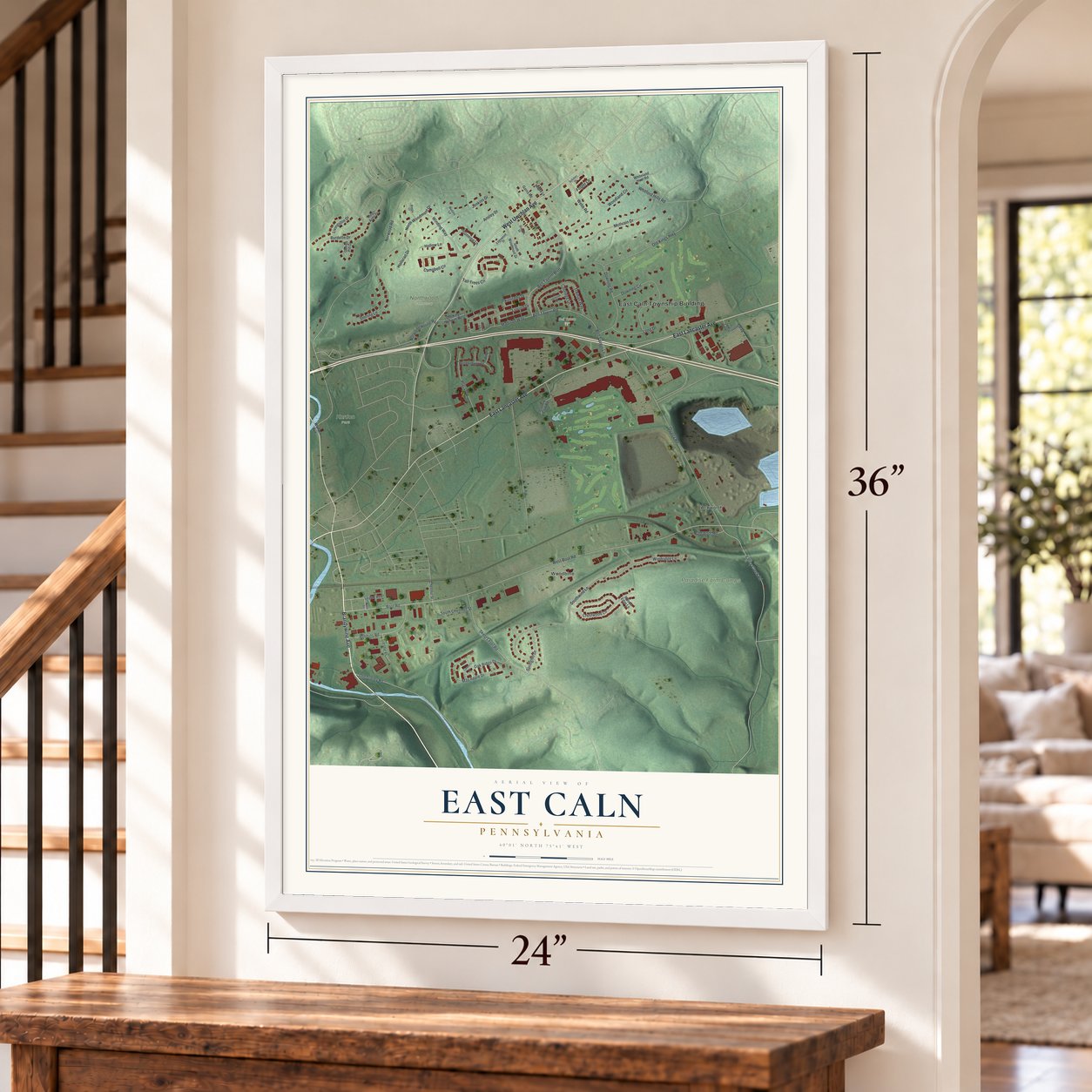 East Caln, Pennsylvania map, 24 x 36 inch print in a white frame by a staircase