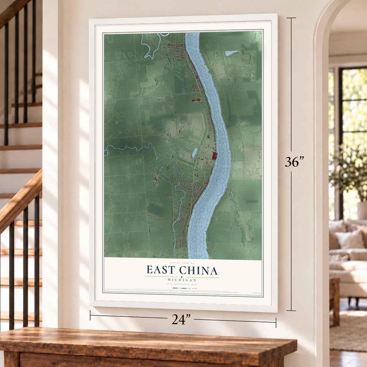 East China, Michigan map, 24 x 36 inch print in a white frame by a staircase