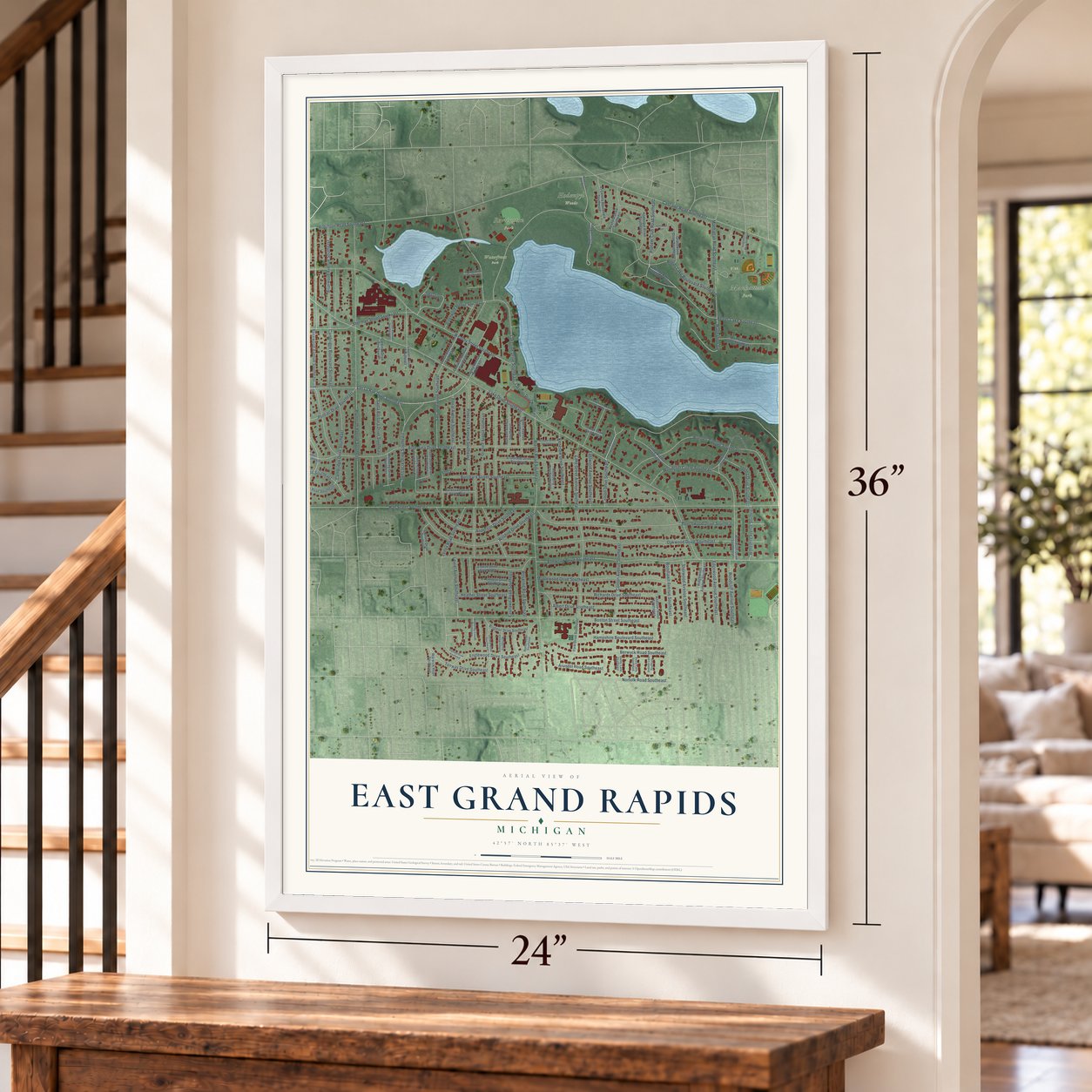 East Grand Rapids, Michigan map, 24 x 36 inch print in a white frame by a staircase