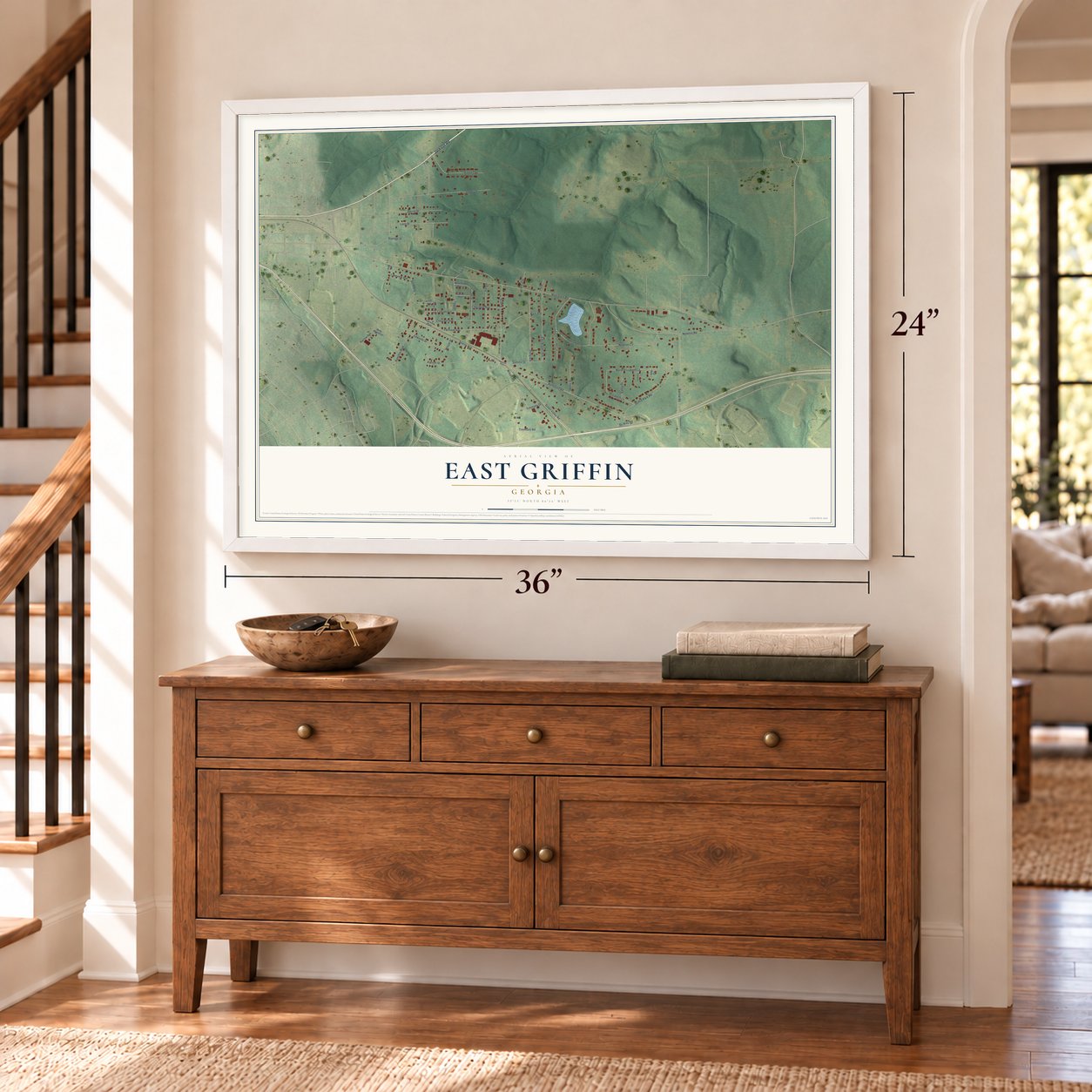 East Griffin, Georgia map, 24 x 36 inch print in a white frame above a dresser by a staircase