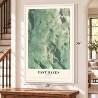 East Haven, Vermont map, 24 x 36 inch print in a white frame by a staircase