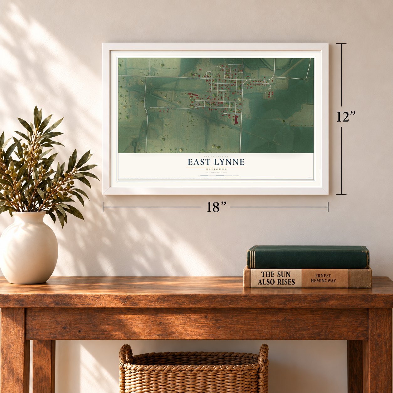 East Lynne, Missouri map, 12 x 18 inch print in a white frame in an entryway