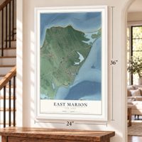 East Marion, New York map, 24 x 36 inch print in a white frame by a staircase