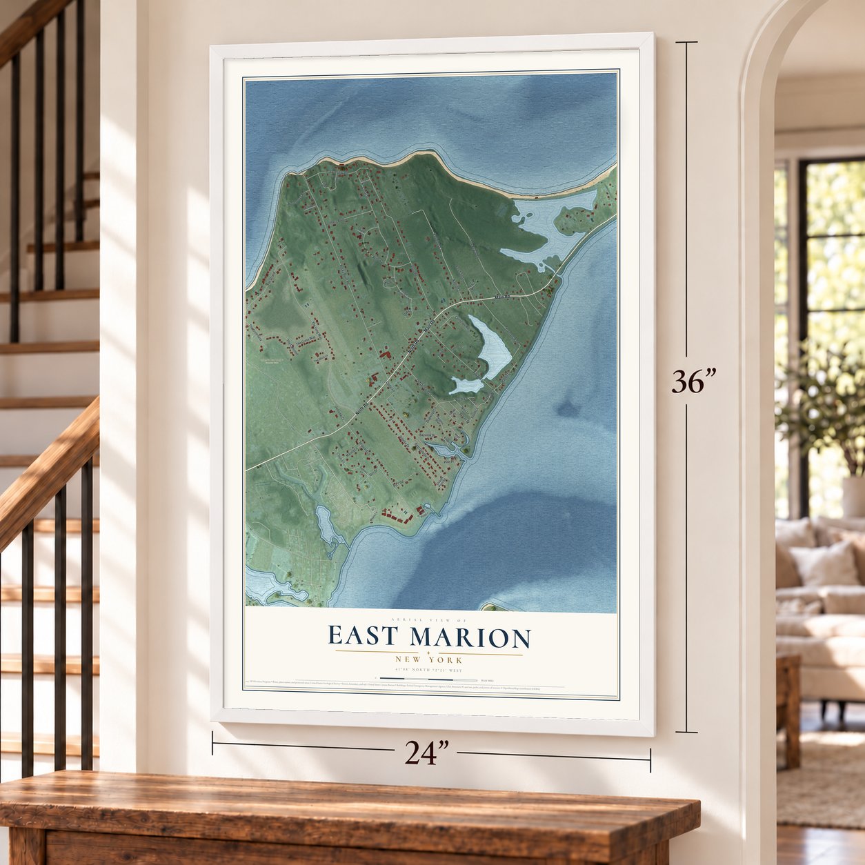 East Marion, New York map, 24 x 36 inch print in a white frame by a staircase