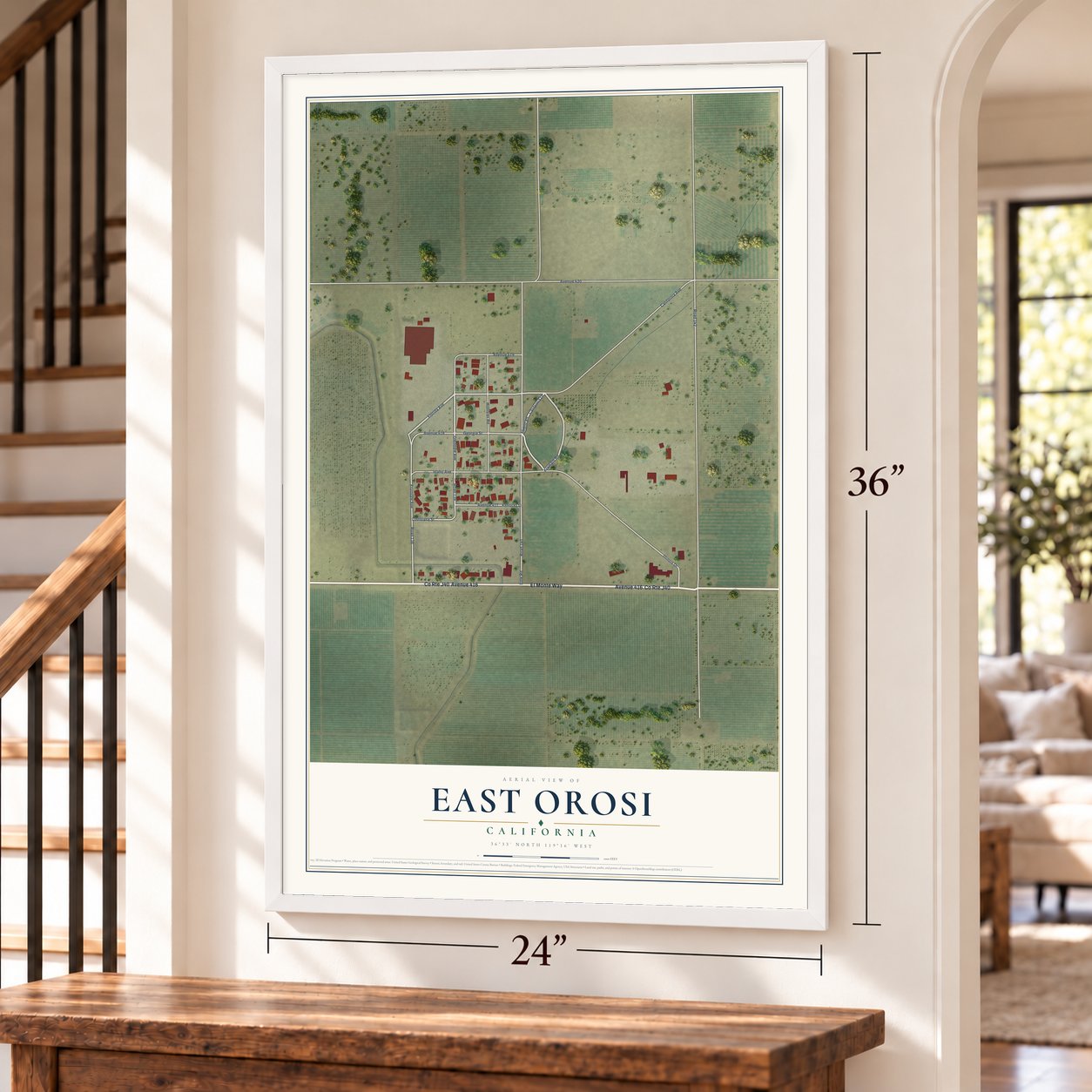 East Orosi, California map, 24 x 36 inch print in a white frame by a staircase