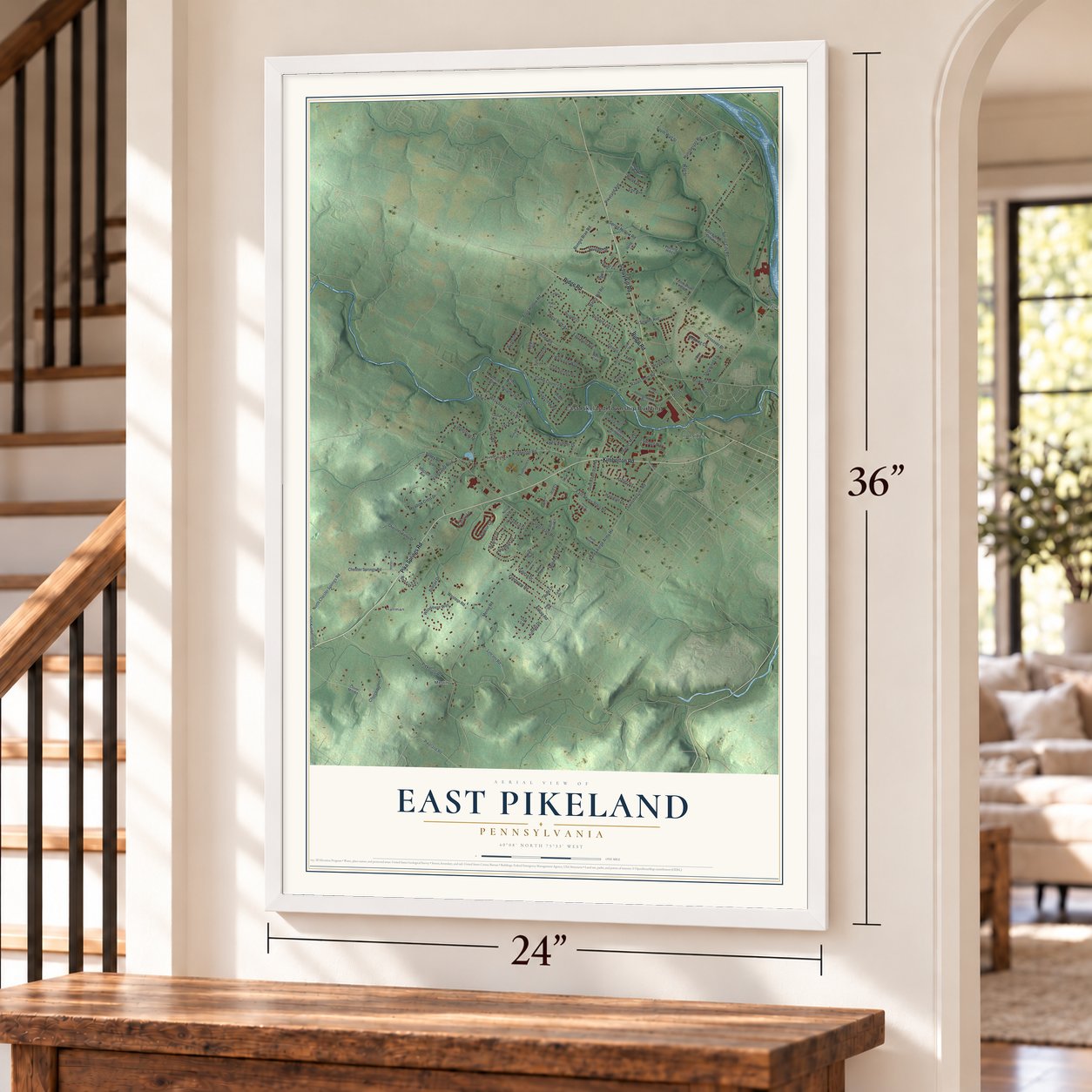 East Pikeland, Pennsylvania map, 24 x 36 inch print in a white frame by a staircase