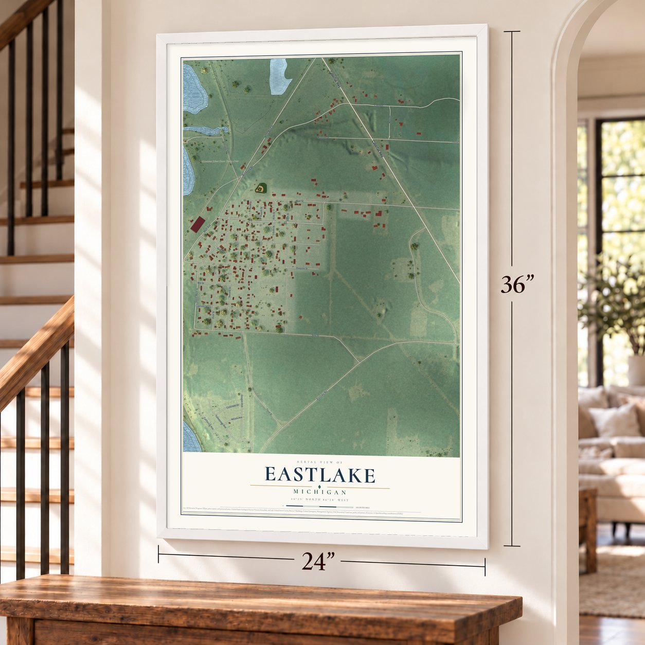 Eastlake, Michigan map, 24 x 36 inch print in a white frame by a staircase
