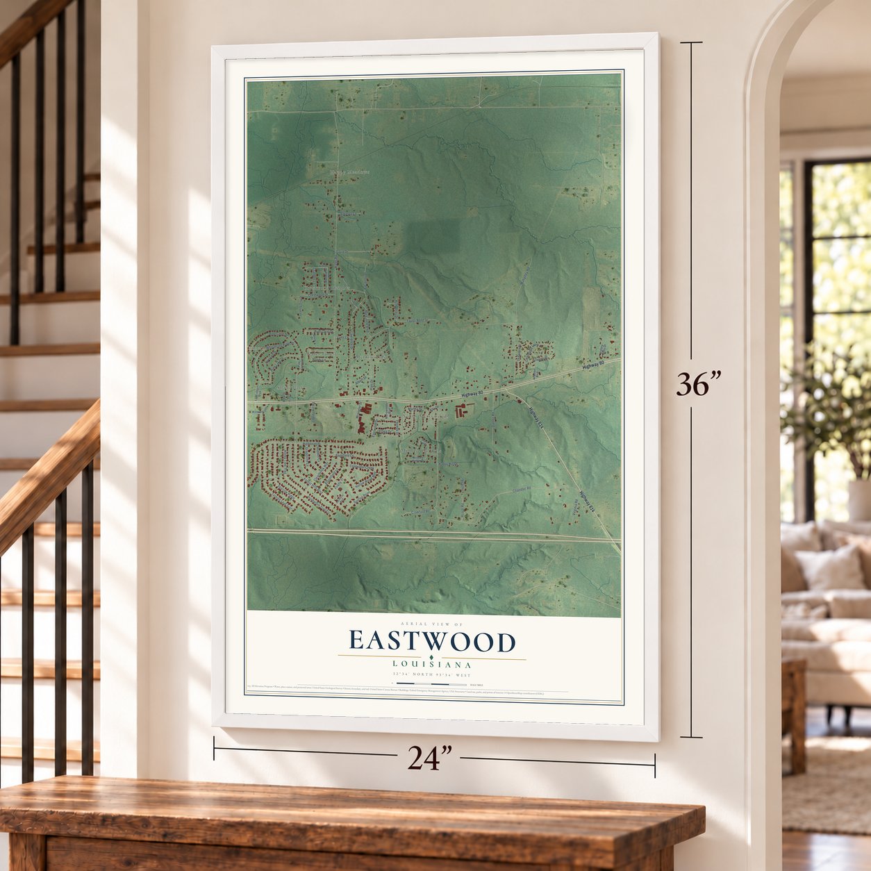 Eastwood, Louisiana map, 24 x 36 inch print in a white frame by a staircase