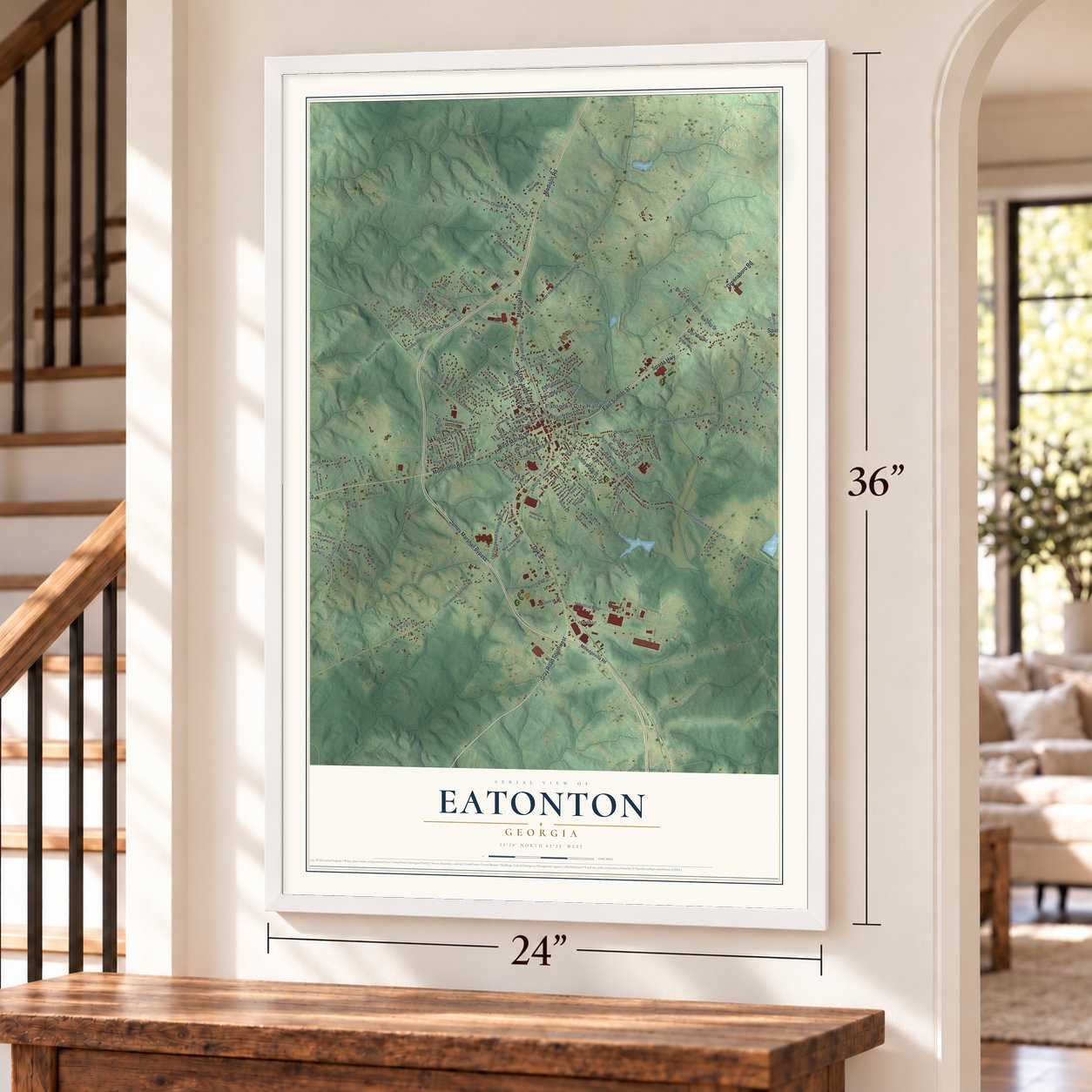 Eatonton, Georgia map, 24 x 36 inch print in a white frame by a staircase