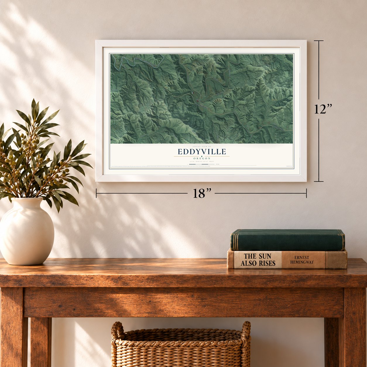 Eddyville, Oregon map, 12 x 18 inch print in a white frame in an entryway
