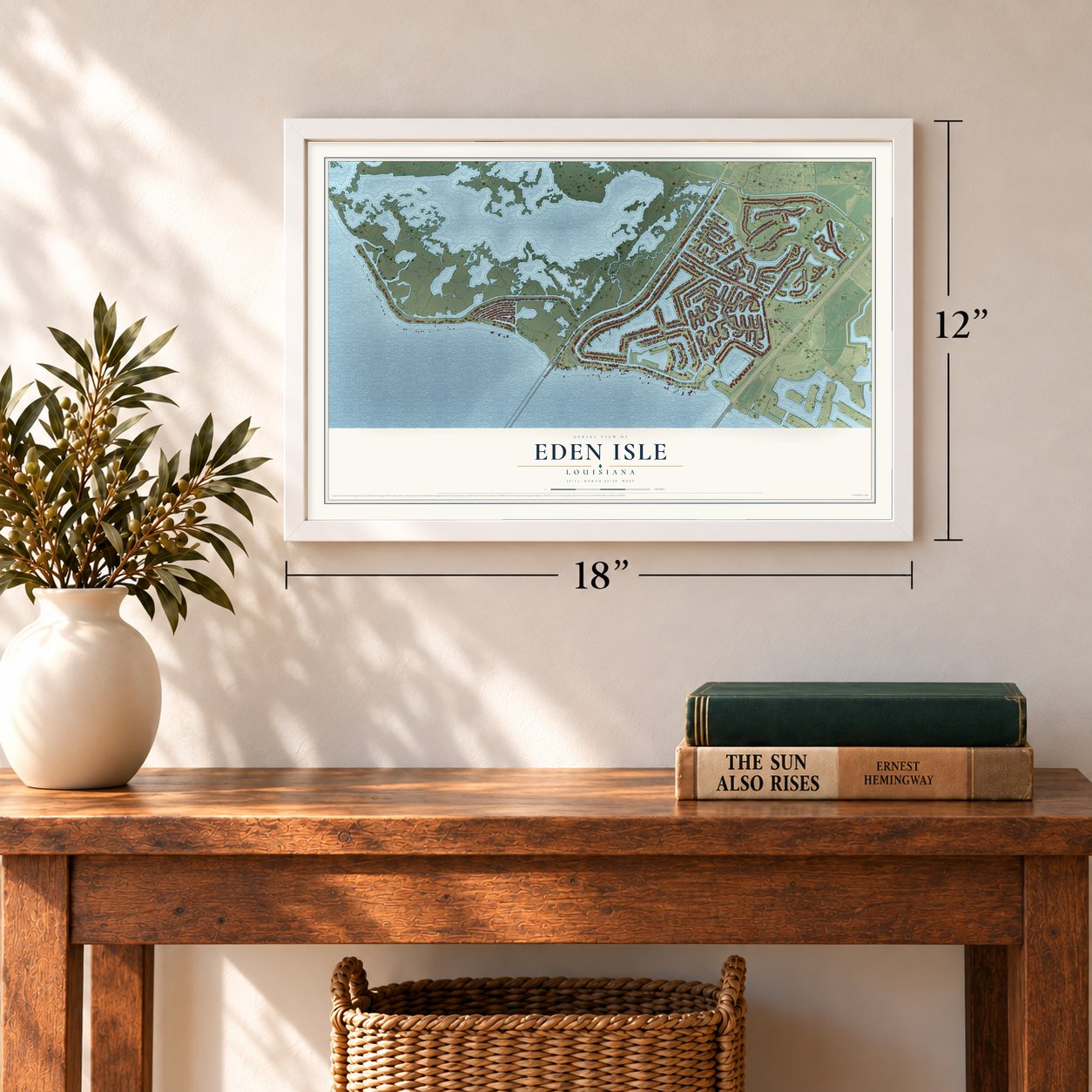 Eden Isle, Louisiana map, 12 x 18 inch print in a white frame in an entryway