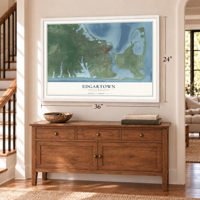 Edgartown, Massachusetts map, 24 x 36 inch print in a white frame above a dresser by a staircase