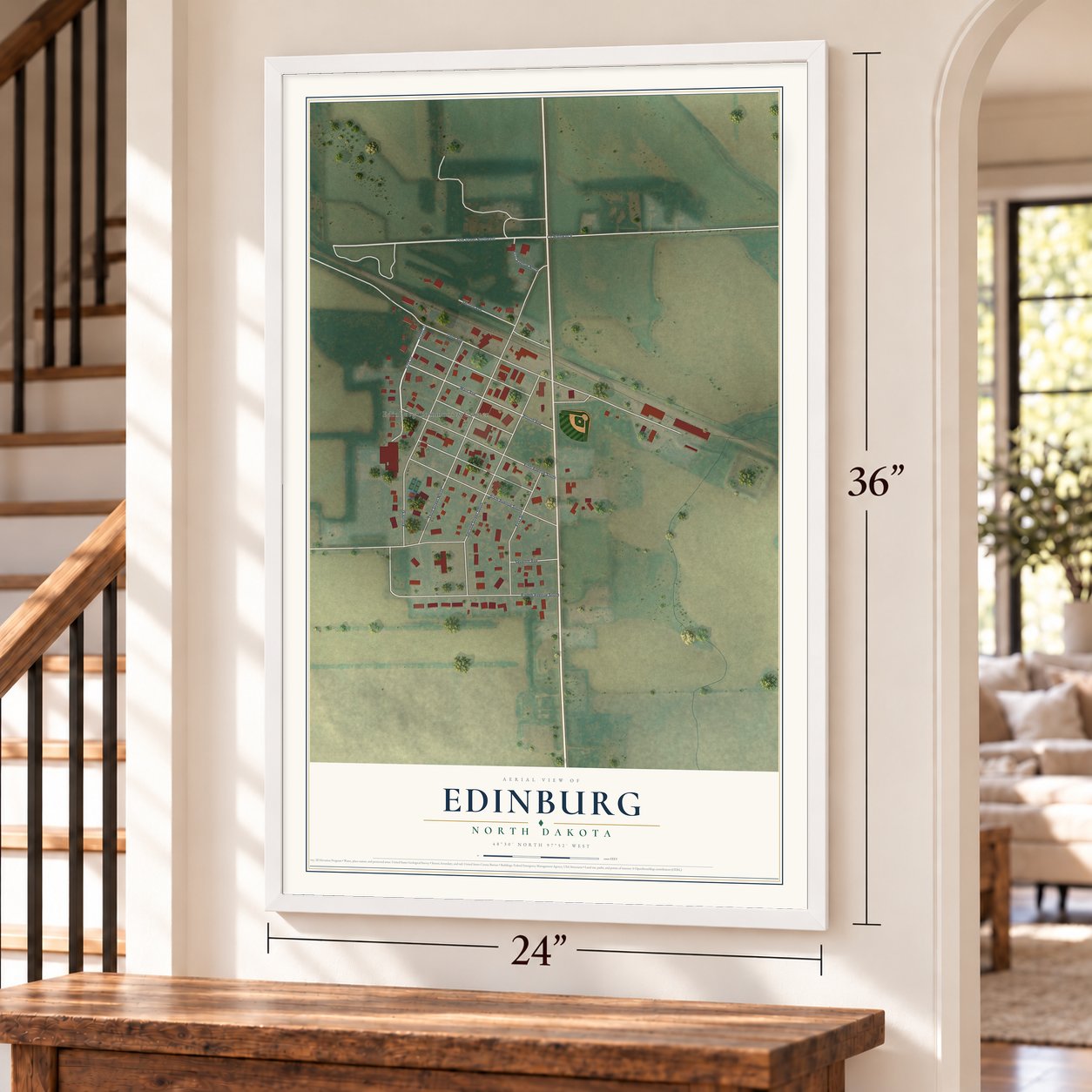 Edinburg, North Dakota map, 24 x 36 inch print in a white frame by a staircase