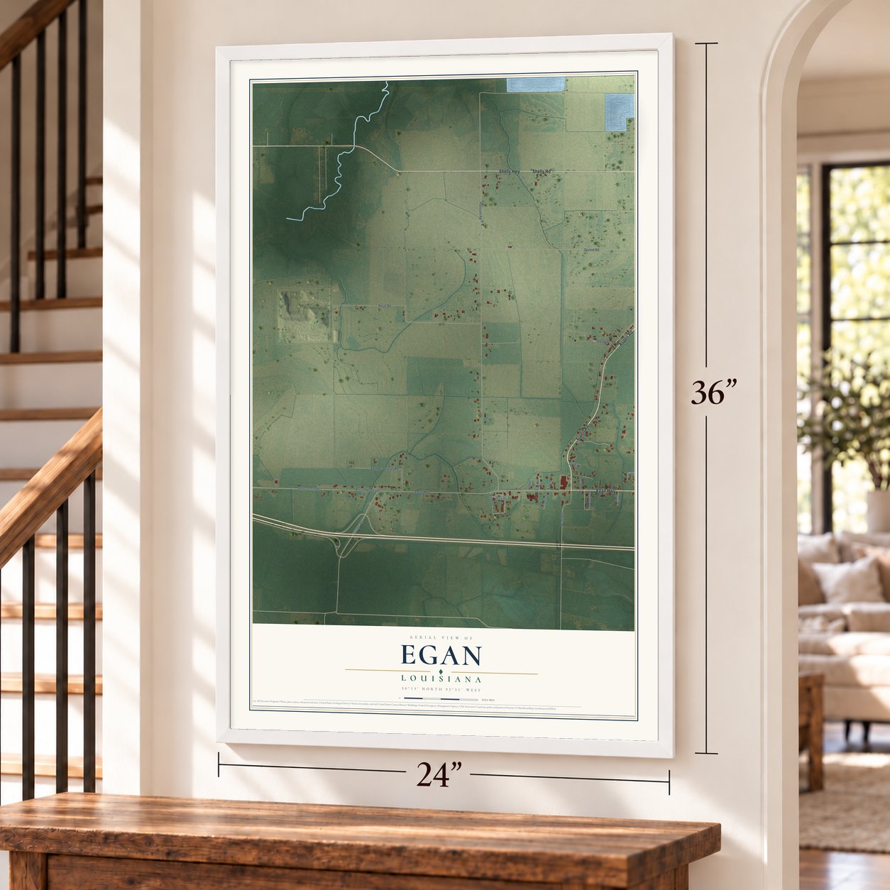 Egan, Louisiana map, 24 x 36 inch print in a white frame by a staircase