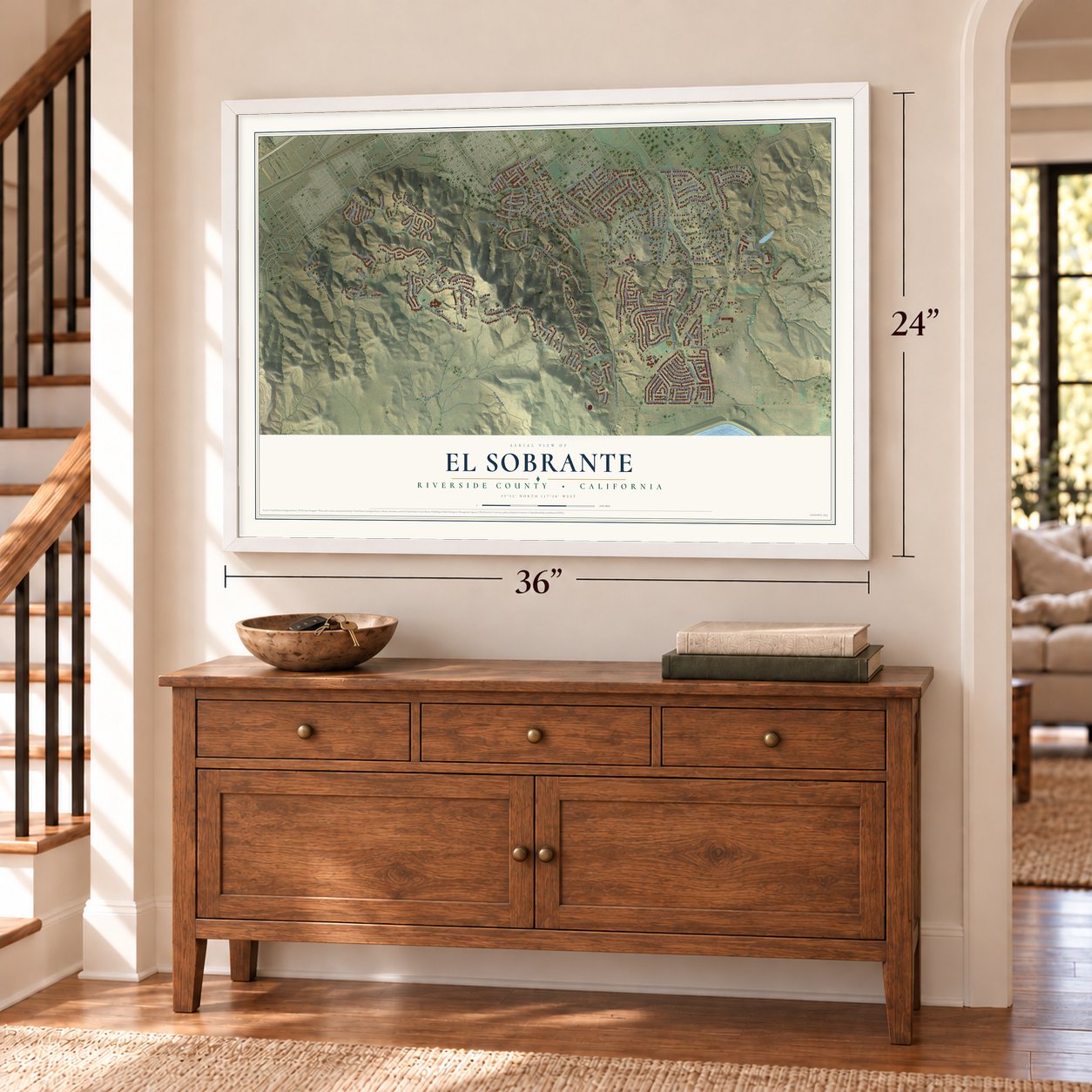 El Sobrante, Riverside County, California map, 24 x 36 inch print in a white frame above a dresser by a staircase