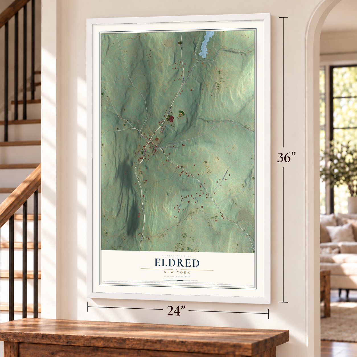 Eldred, New York map, 24 x 36 inch print in a white frame by a staircase