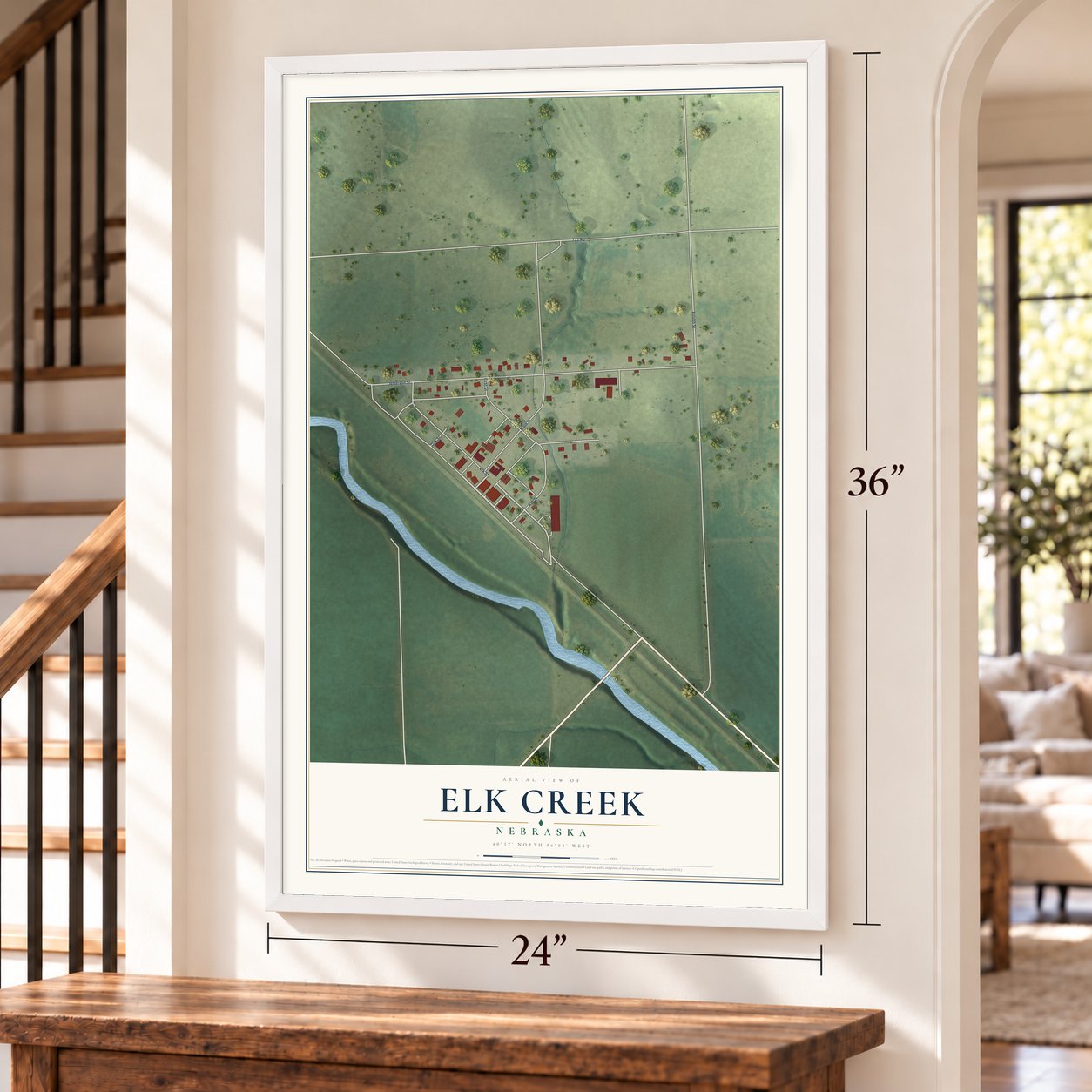 Elk Creek, Nebraska map, 24 x 36 inch print in a white frame by a staircase