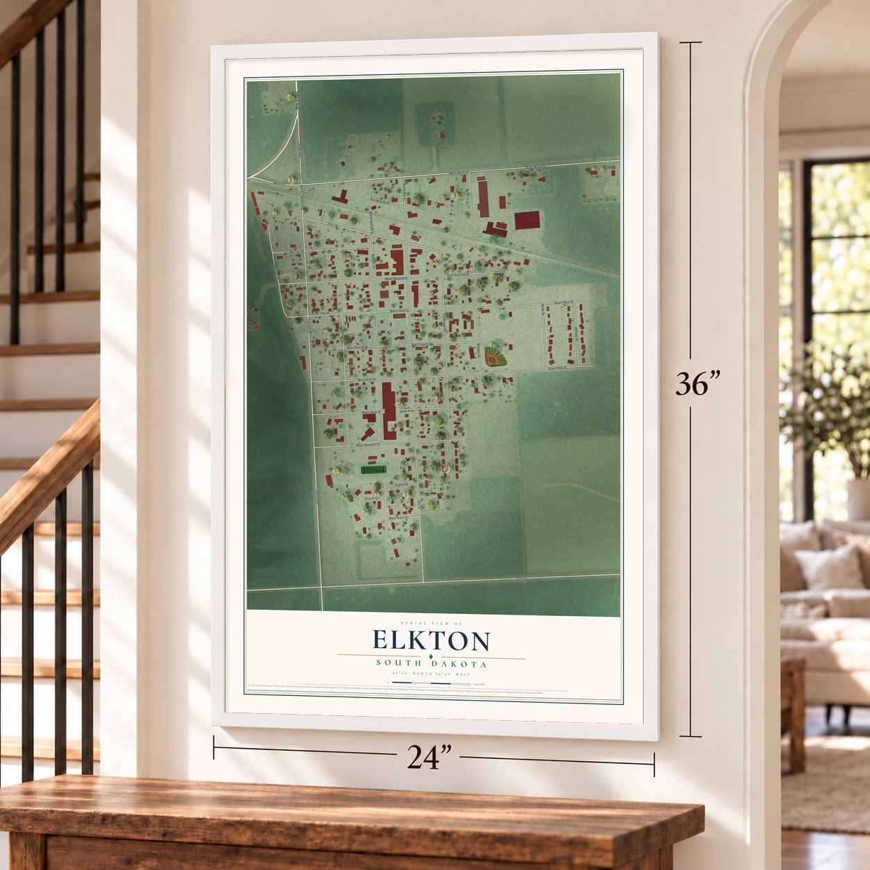 Elkton, South Dakota map, 24 x 36 inch print in a white frame by a staircase
