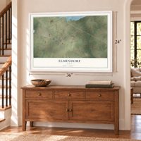 Elmendorf, Texas map, 24 x 36 inch print in a white frame above a dresser by a staircase