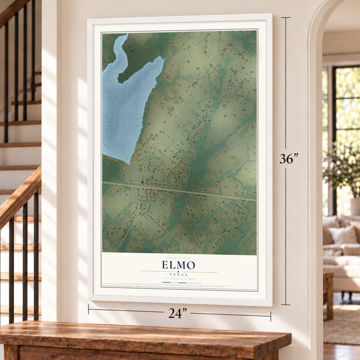 Elmo, Texas map, 24 x 36 inch print in a white frame by a staircase