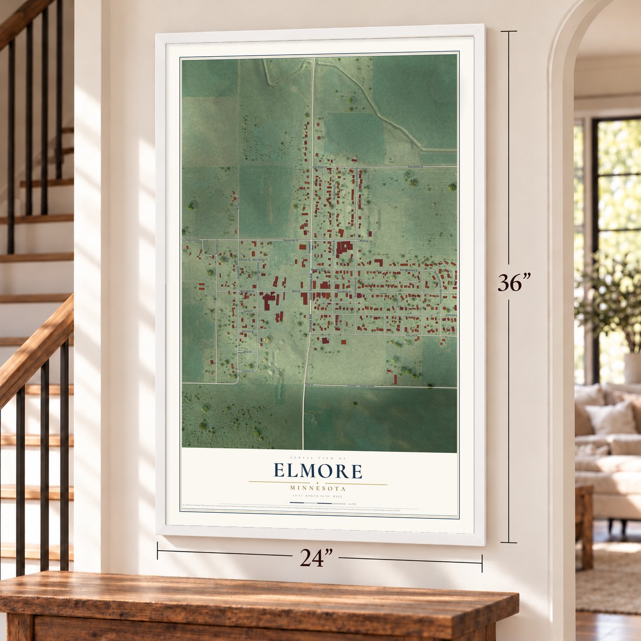 Elmore, Minnesota map, 24 x 36 inch print in a white frame by a staircase