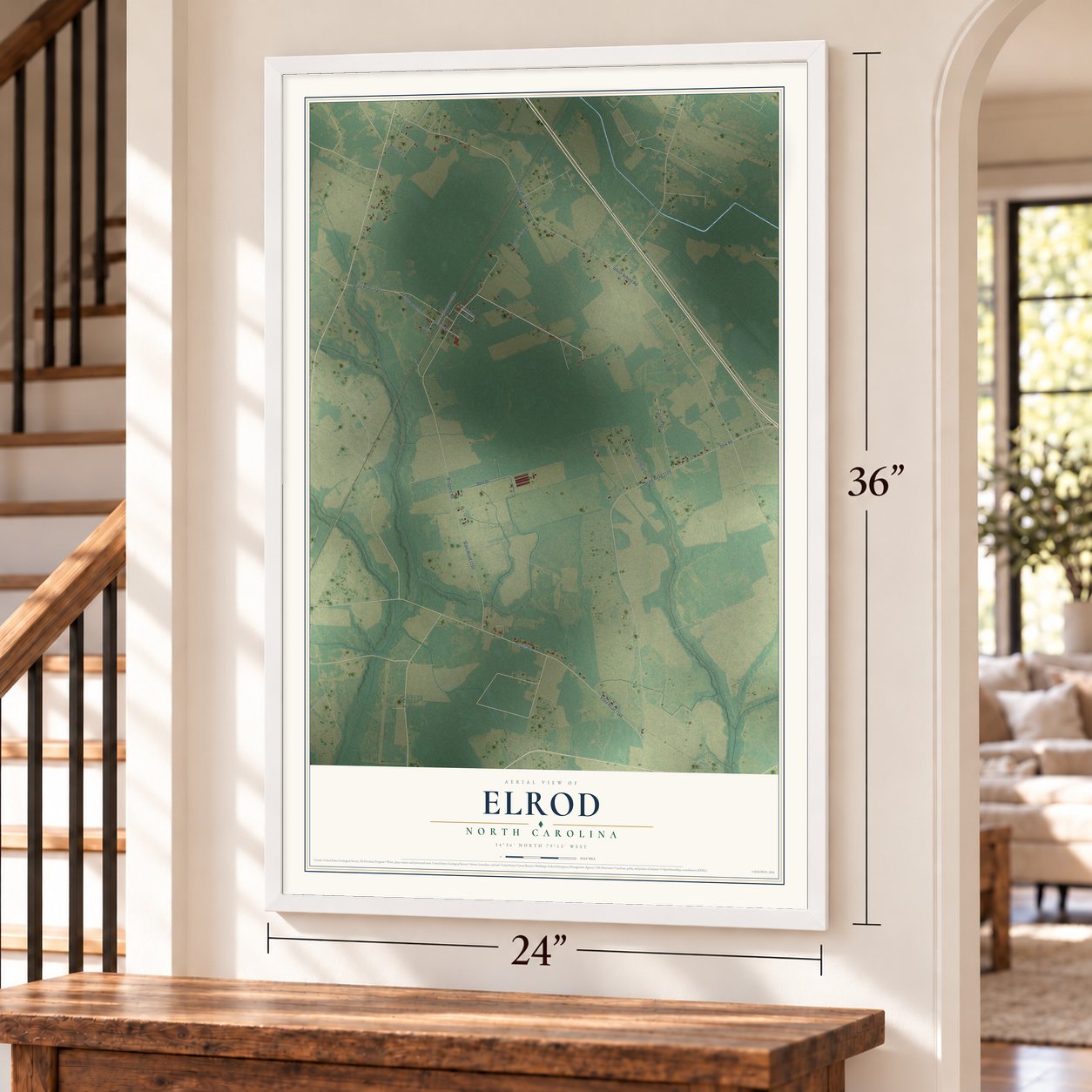 Elrod, North Carolina map, 24 x 36 inch print in a white frame by a staircase