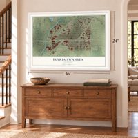 Elyria Swansea, Colorado map, 24 x 36 inch print in a white frame above a dresser by a staircase