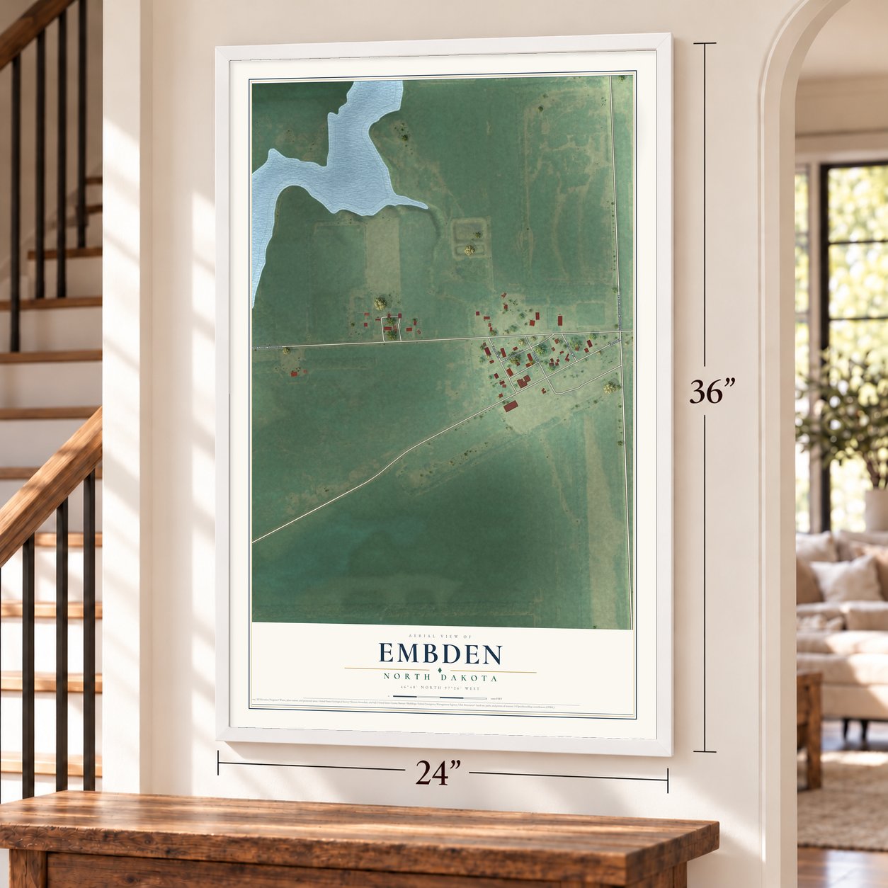Embden, North Dakota map, 24 x 36 inch print in a white frame by a staircase
