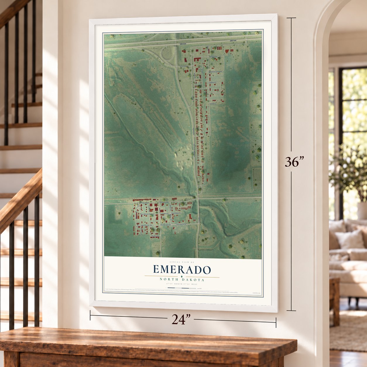 Emerado, North Dakota map, 24 x 36 inch print in a white frame by a staircase