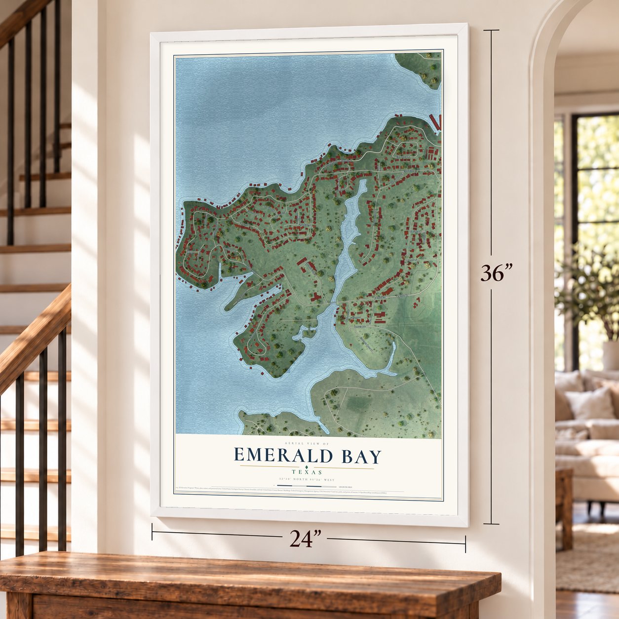Emerald Bay, Texas map, 24 x 36 inch print in a white frame by a staircase