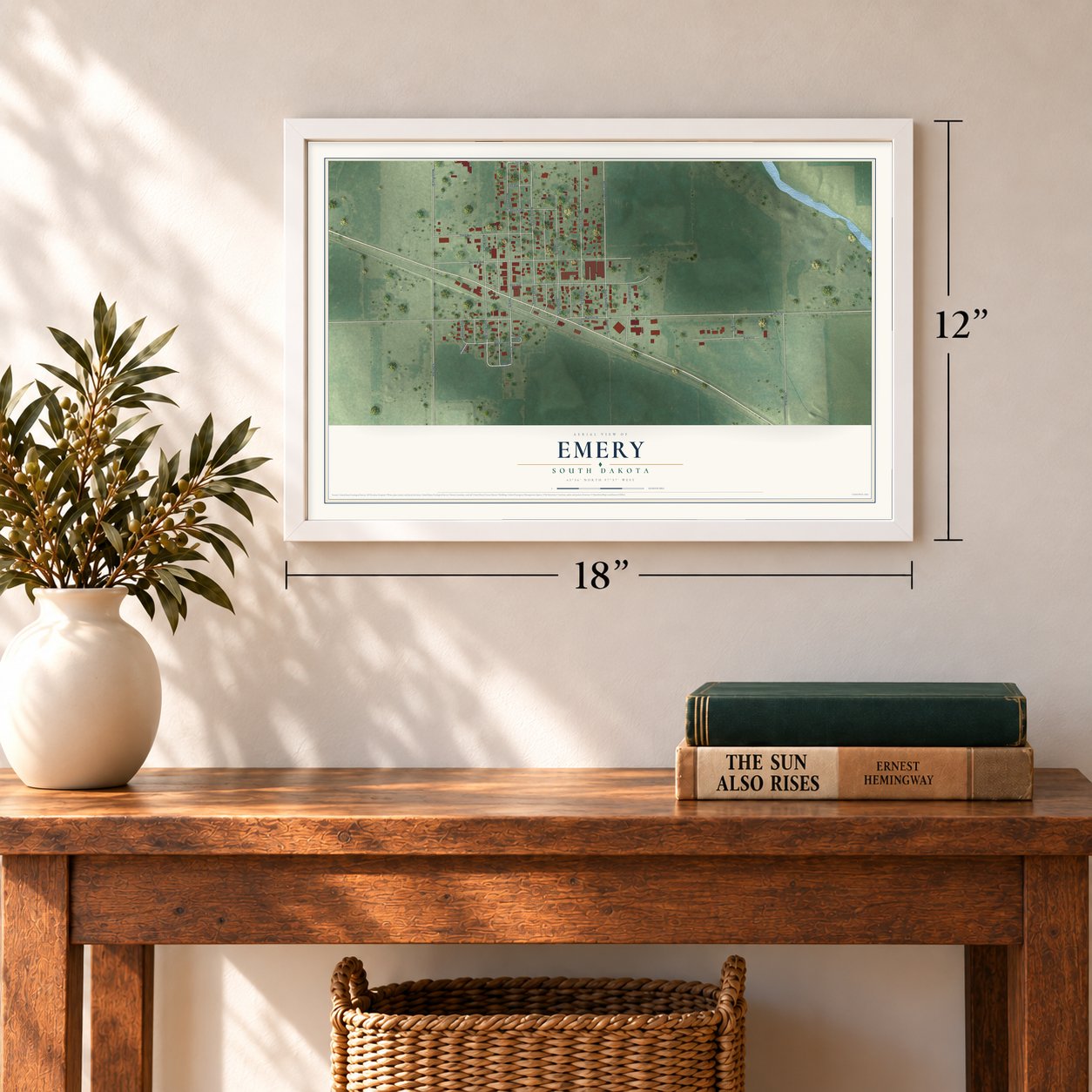 Emery, South Dakota map, 12 x 18 inch print in a white frame in an entryway