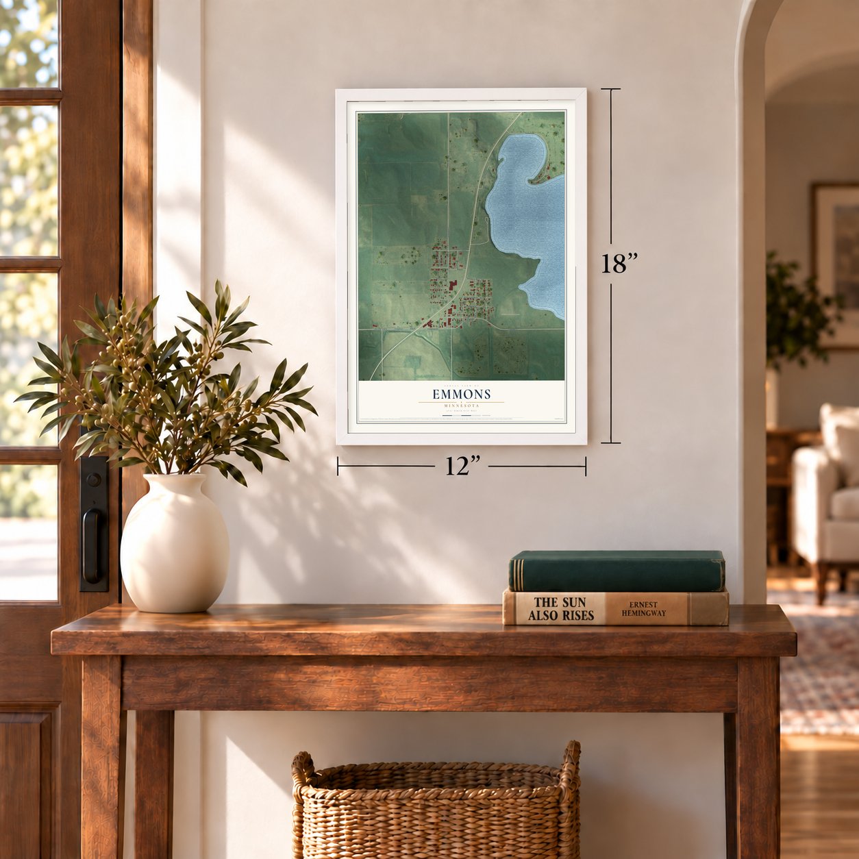 Emmons, Minnesota map, 12 x 18 inch print in a white frame in an entryway