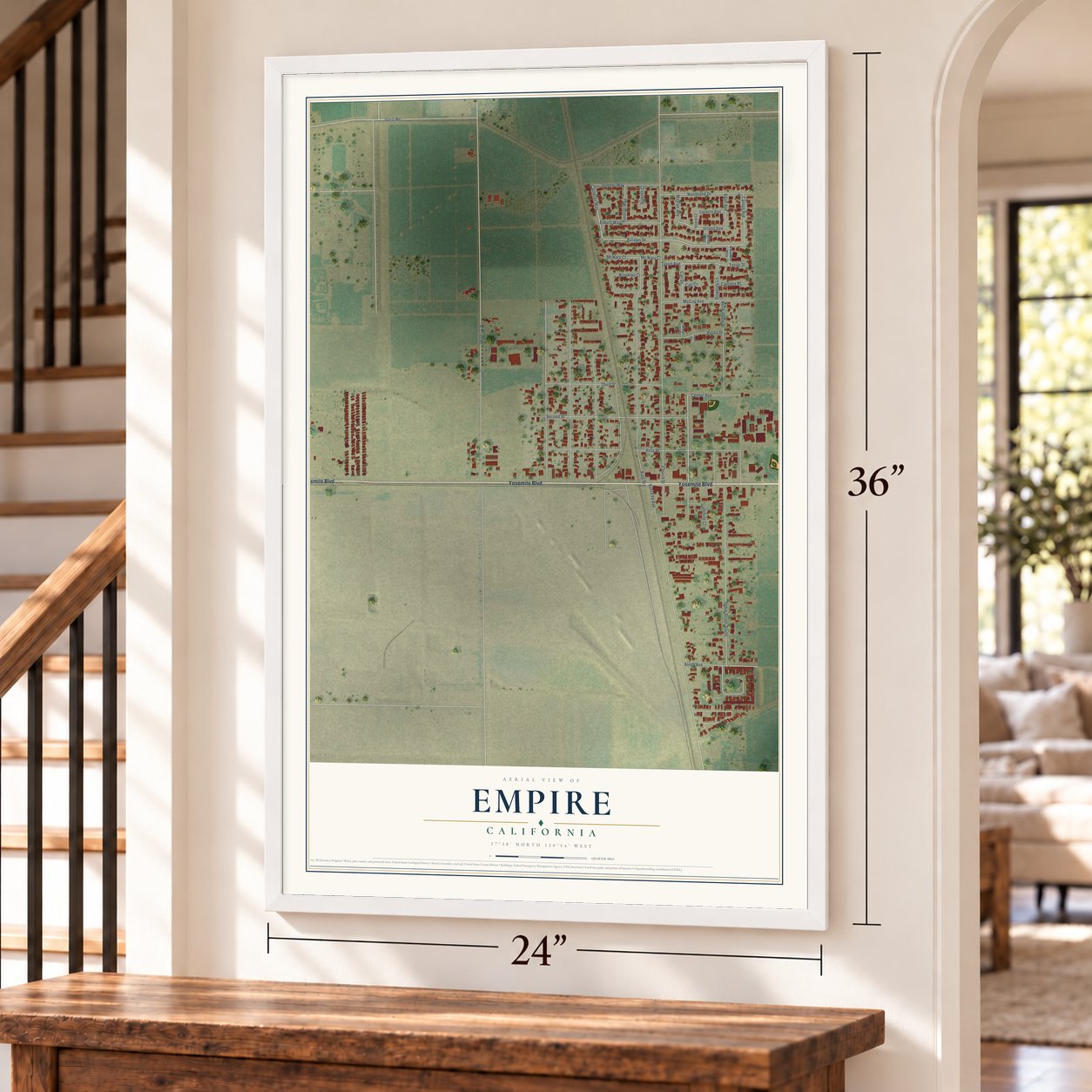 Empire, California map, 24 x 36 inch print in a white frame by a staircase
