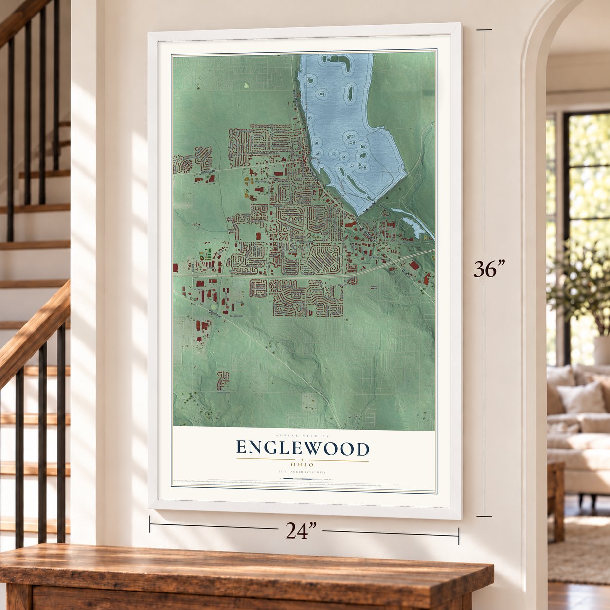 Englewood, Ohio map, 24 x 36 inch print in a white frame by a staircase