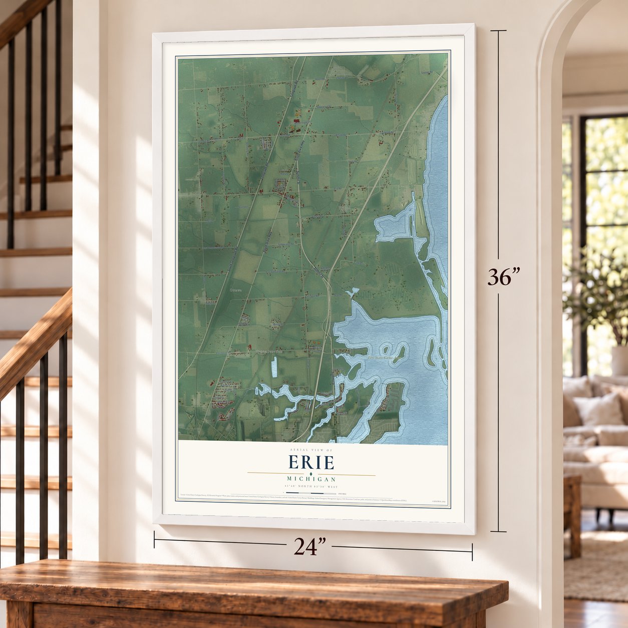Erie, Michigan map, 24 x 36 inch print in a white frame by a staircase
