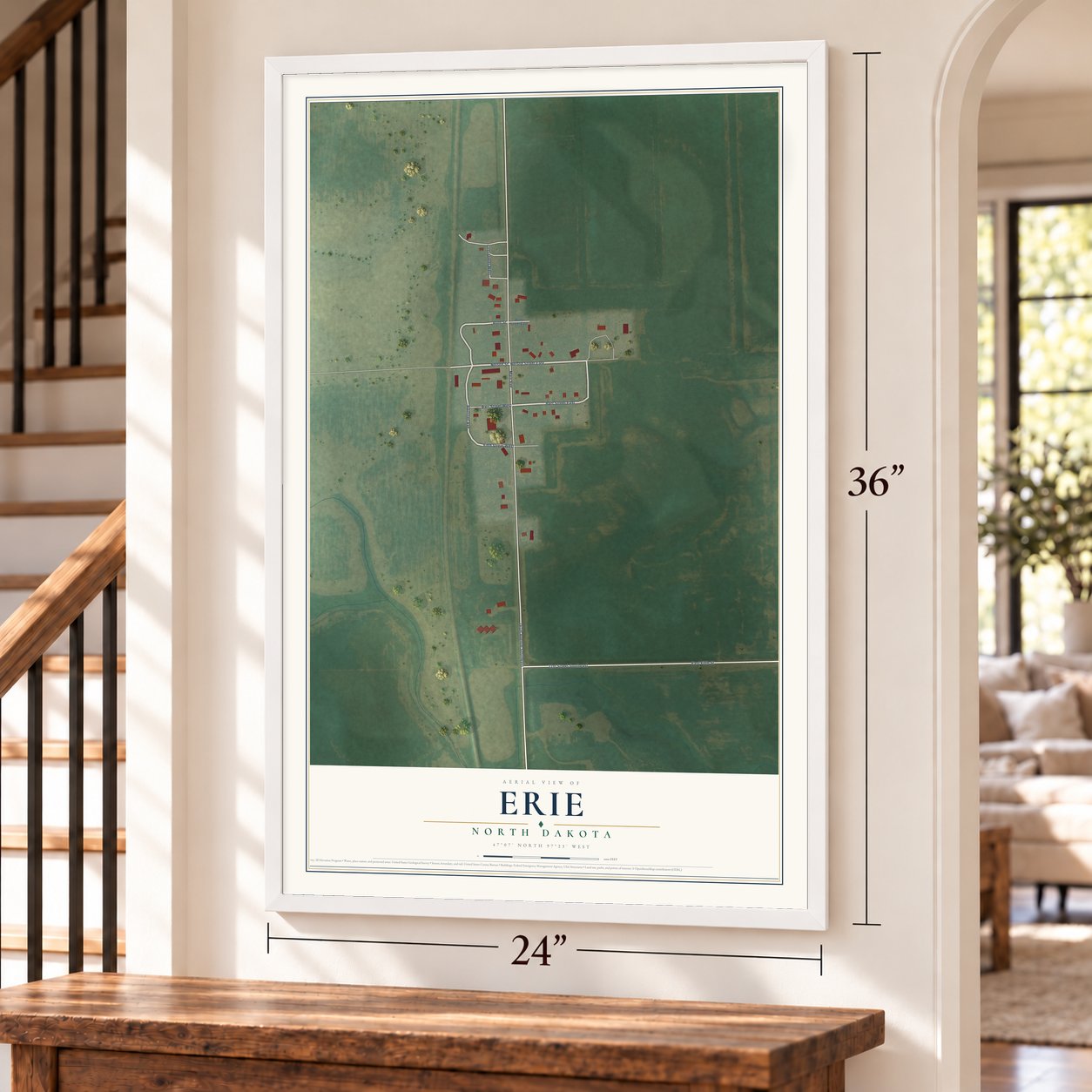Erie, North Dakota map, 24 x 36 inch print in a white frame by a staircase
